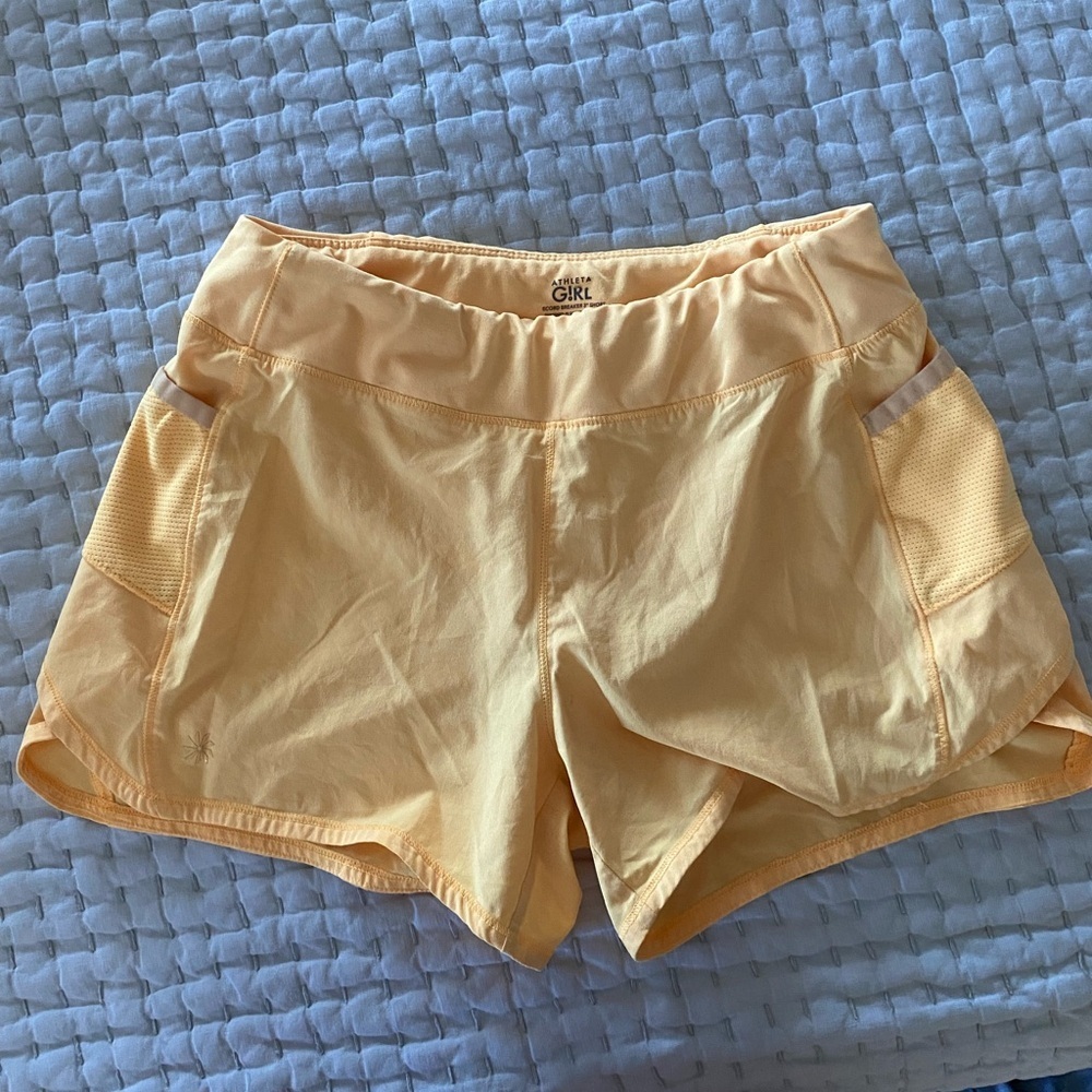 Athleta Girl yellow shorts, size 12